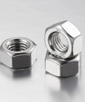 Close-up view of Beefy 1/4-20 Stainless Steel Hex Nuts Set, 50 Pieces, Coarse UNC Threads, featuring 304 stainless steel construction.
