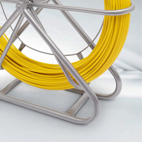 Close-up of yellow 425 Ft Fiberglass Fish Tape, steel wheel stand, visible quarter-inch fishtape coil for wire pulling.