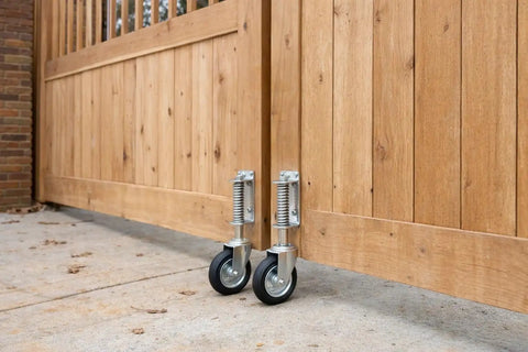 8 Inch Spring Loaded Gate Caster With 360 Degree Swivel Built To Last Heavy Duty 375 Lb Capacity, Solid Rubber Flat Free Wheel, Universal Mount For Farm Driveway Wood And Metal Tube Gates installed on wooden gate