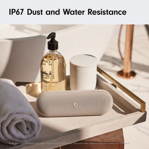 Pill Wireless Bluetooth Speaker And Portable USB C Charger With All Day Battery Life IP67 Water Resistant in bathroom setting