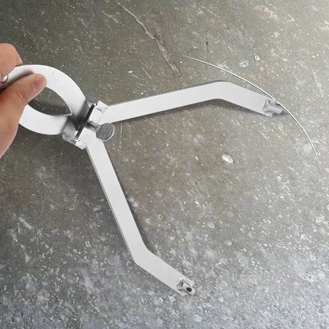 Hand holding a 24 Inch Radius Divider Tool for Metalworking and Woodworking Precision Scriber on a concrete surface.