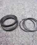 Water jet spare parts T-seal A-00251-18 for piston assembly; close-up of black seals with thick rings and spacers.