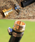 Solid Brass Garden Hose Repair Kit With Stainless Steel Clamps, Swivel Fittings And Three Quarter Inch Barb To Three Quarter Inch Female Adapters, Includes Gasket And PTFE Tape, US Garden Hose Thread For Quick, Leak Free Outdoor Watering on a stone surface and attached to a hose.