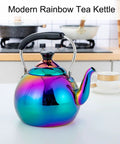 Induction Compatible Stovetop Tea Kettle Stainless Steel Whistling Tea Kettle Rainbow Iridescent Mirror Finish 2 Quart For Gas Stove Top Fast Boiling Water Modern Colorful Teakettle on white counter