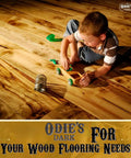 Boy playing on wooden floor treated with Dark Wood Oil Finish And Stabilizer That Deepens With Age, Food Safe And Solvent Free