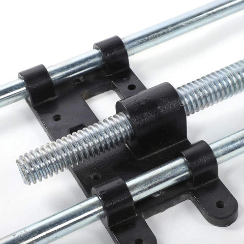 Heavy Duty Steel Front Mount Shop Vise For Workshop Bench Clamping And Woodworking Projects Built Tough As Nails close-up of threaded rod and mounting brackets.