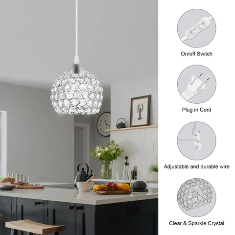 Three Light Black Hanging Ceiling Light Chandelier With Crystal Accents Adjustable Farmhouse Pendant in modern kitchen setting.