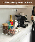 Clear Acrylic Coffee Station Organizer For Countertop And Office Breakroom displayed with coffee supplies
