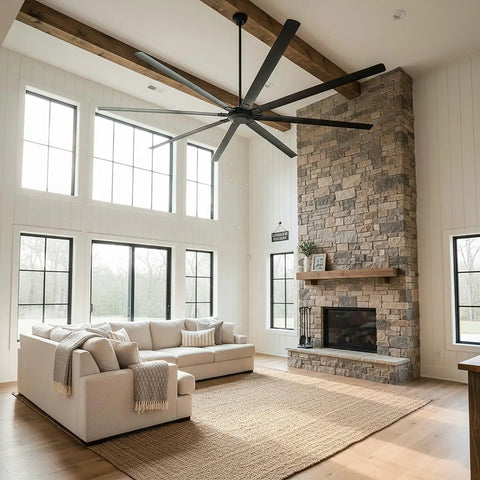 Massive 120 Inch Industrial Black Ceiling Fan With No Lights Ultra High Airflow 36000 CFM installed in living room with tall windows