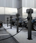 Built Like A Tank Rock Solid Weatherproof EV Charger Pedestal Stand Mount For Dual Electric Car Stations in a parking area.