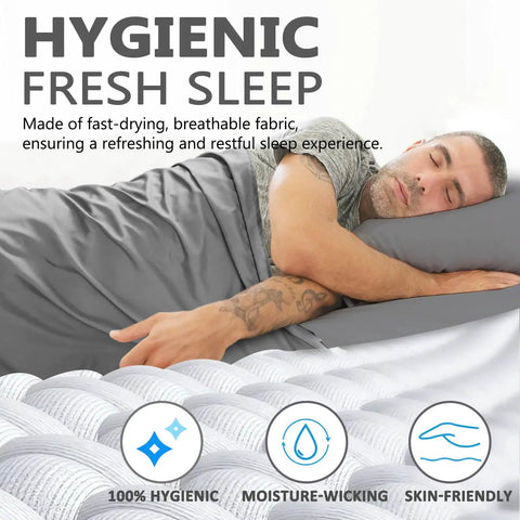 Person sleeping under Ultralight Sleeping Bag Liner Travel Sheet Three Size Options For Backpacking Camping Hotels And Hostels Breathable Silky Soft Cozy Lightweight Compact Gray 27.5x84.6 Inches Great For Travel Quick Dry Easy Care, highlighting comfort and fabric benefits.
