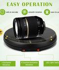 360 Degree Motorized Rotating Display Stand Turntable With Built-In LED Lighting For Jewelry And Photography Products Electric Base USB Powered Smooth Rotation Showpiece Spinner 10 Inch Capacity with camera lens example on turntable.