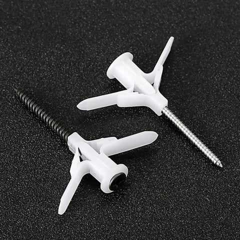 400Pcs Self Drilling Wall Anchors Kit with butterfly nylon expansion design and internal threads, shown on dark surface