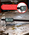 Dope Digital Caliper 12 Inch With Ultra Precision 0.001 Inch Accuracy on workshop table showing 14.33 mm