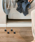 Set Of 4 Adjustable Rubber Foot Levelers With Iron Threaded Studs Anti Slip Furniture Leg Glides on laundry room floor