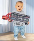 Child holding 18 Car Transporter Truck Toy With 18 Mini Cars Kid Safe Car Carrier Playset For Boys And Girls Aged 3 To 10