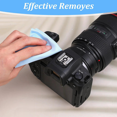 Blue microfiber cleaning cloth used to wipe a DSLR camera lens
