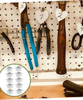 10 Pack Metal Bearing Swivel Casters For Easy Furniture And Workbench Mobility shown with workshop tools on pegboard