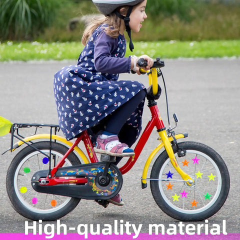 Child riding bike with Colorful Bike Wheel Spoke Beads Set With Round And Star Shapes, 72 Pieces With Plastic Storage Box Included.