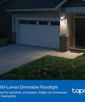 2K Outdoor Pan Tilt Floodlight Security Camera Battery Powered With Solar installed on garage wall at night