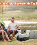 Couple camping with Portable Solar Generator 300W Power Station With Foldable 60W Solar Panel And 280Wh Battery Pack nearby
