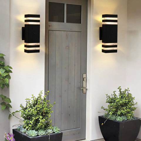 Two Pack Dusk To Dawn Outdoor Wall Lights Up And Down Sconce Black Aluminum Waterproof Exterior Porch Lights 3000K Warm White No Fuss Auto On Off Sensor For House Doorways installed beside a front door