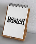 Notebook on stand with 'Posted' design, related to Go To Small Duo Hand Stamp For Mail And Parcels, Postage Marking Tool.