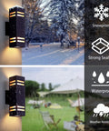 Image showing Dusk To Dawn Outdoor Wall Light 2 Pack Brown Up Down Sconce Dope Aluminum Porch Lighting for House Front Door IP65 during snow and rain.