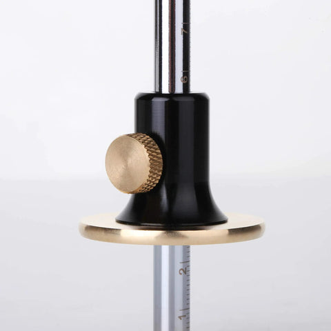 Close-up of Wheel Marking Gauge With Two Extra Blades And Laser Engraved Graduations And A Solid Brass Face Adjustable For Precise Parallel Layouts On Wood Projects Must Have For DIY Woodworking, showing black handle and brass face.