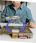 Child using Heavy-Duty Soldering Helping Hand Tool With Flexible Arms And Welding Station Holder For Expert Pcb Repair