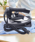 Heavy Duty Workhorse Gravity Feed Steam Iron With Hefty 3L Reservoir And Slick Nonstick Soleplate for garment finishing and pressing.