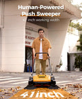 Heavy Duty Manual Walk Behind Floor Sweeper With 41 Inch Wide Cleaning Path For Warehouses Non Electric Broom with rubber wheels in use.