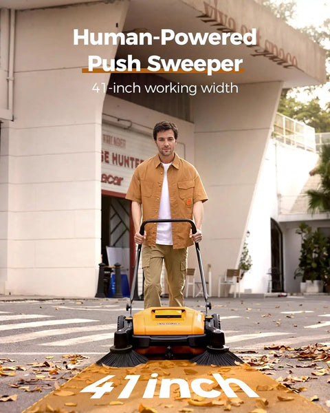 Heavy Duty Manual Walk Behind Floor Sweeper With 41 Inch Wide Cleaning Path For Warehouses Non Electric Broom with rubber wheels in use.
