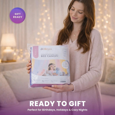 Pink Princess Bed Canopy With Glowing Stars For Girls product held by woman, rainbow netting packaging, gift ready scene