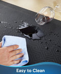 Cleaning liquid spill on Anti Fatigue Kitchen Mat 0.75 Inch Thick Cushioned Floor Mat 17x24 Waterproof Non Slip Ridged Bottom