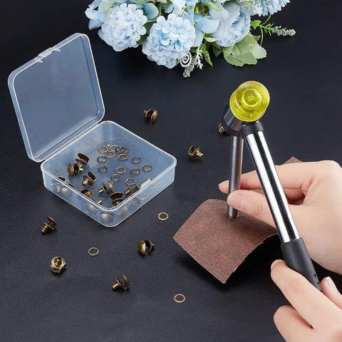 20 Piece Boot Hook Kit With Brass Shoelace Eyelets And Rivets, person using press stud tool on brown fabric