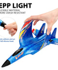 Close-up of hand holding blue SU27 RC Airplane Ready To Fly Glider with EPP foam construction and silicone nose protection