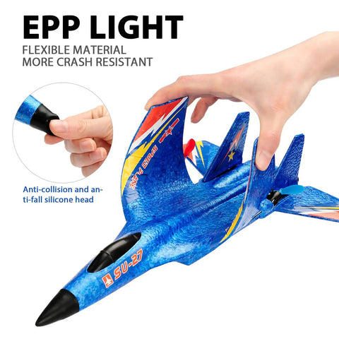 Close-up of hand holding blue SU27 RC Airplane Ready To Fly Glider with EPP foam construction and silicone nose protection