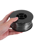 1KG Flux Core Welding Spool With Self-Shielding Metal Tin Wire for Precision Electronics Projects held in hand.