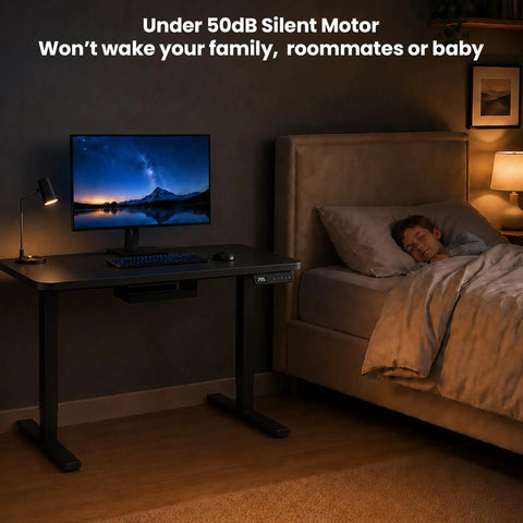 AdGiGi 40 Inch Electric Standing Desk Adjustable Height Sit Stand Workstation Compact Computer Table For Home Office Small Space Black, shown in a bedroom with a child sleeping.