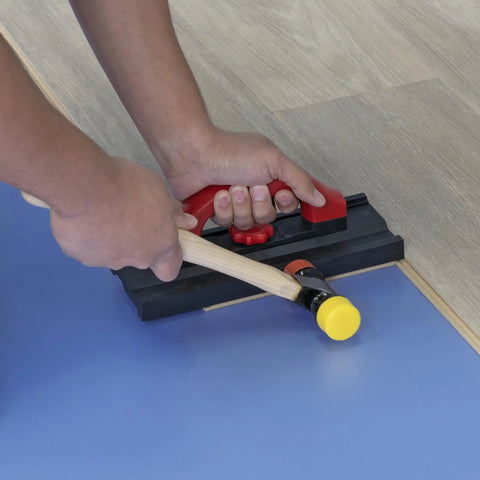 Using 10 Inch Double Tap Plastic Tapping Block For Your Floor Install Dual Sided Red And Black Edges For Tongue And Groove And Click Lock