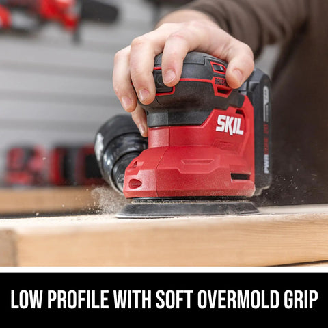 Cordless 20 Volt Brushless Random Orbital Sander Kit With 2 Amp Battery Charger Dust Bag And Sandpaper Packs held for sanding wood.