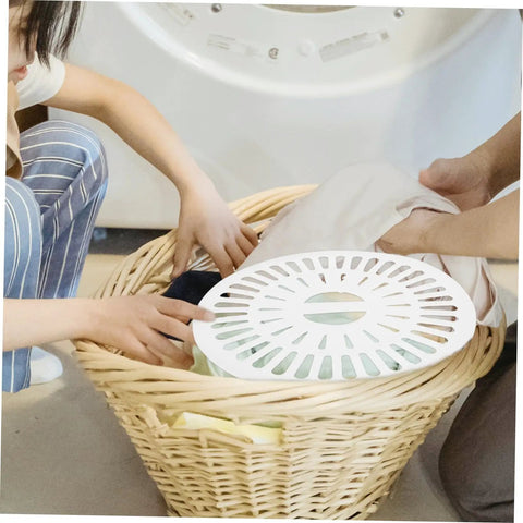 Two Pack Washer Spinner Cap Dryer Cover Protector visible in laundry basket next to washing machine