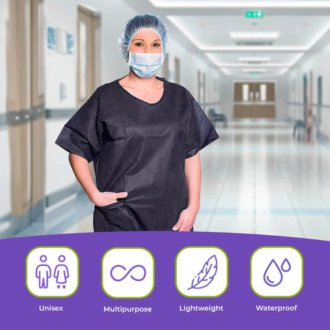 Pack Of Ten Dark Blue Disposable Scrub Shirts Unisex Adult Large Lightweight Spunbond Polypropylene Short Sleeve Top with double chest pockets worn in a hospital hallway.