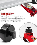 Front view of a red hydraulic floor jack lifting a car, with four black Mapleza Corvette lift pucks visible.