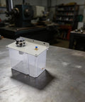 Real Deal Heavy Duty Machine Tool Cooling Sprayer Rig With Flexible Shaft And Precision Flow Control For Cnc Water And Cutting Fluid Lubrication Pump System, clear 3L tank displayed on a workshop table.