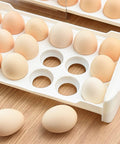 White tray from Clear Refrigerator Egg Holder For 36 Eggs Two Layer Egg Storage Drawer With 18 Slot Trays Fridge Organizer Box