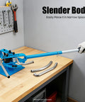 Heavy Duty Manual Pipe Bender With Seven Dies Ranging From One To Three Inches For Bending Metal Rods in a garage setup.