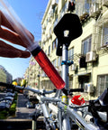 Using an All In One Hydraulic Brake Bleed Kit With 120ml Mineral Oil, Funnel, Syringes And Adapters For MTB And Road Disc Brakes in outdoor setting