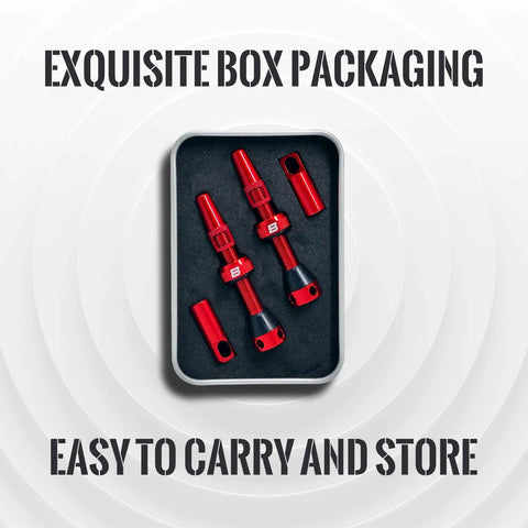Front view of a pair of red anodized alloy Presta valve stems kit in a metal tin with foam insert